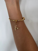 POLE CHARMS - Pendentif "Superwoman" Doré